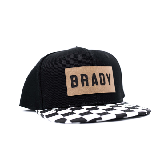 BRADY (Leather Custom Name Patch) - Kids Trucker Hat (Black/Checkered)