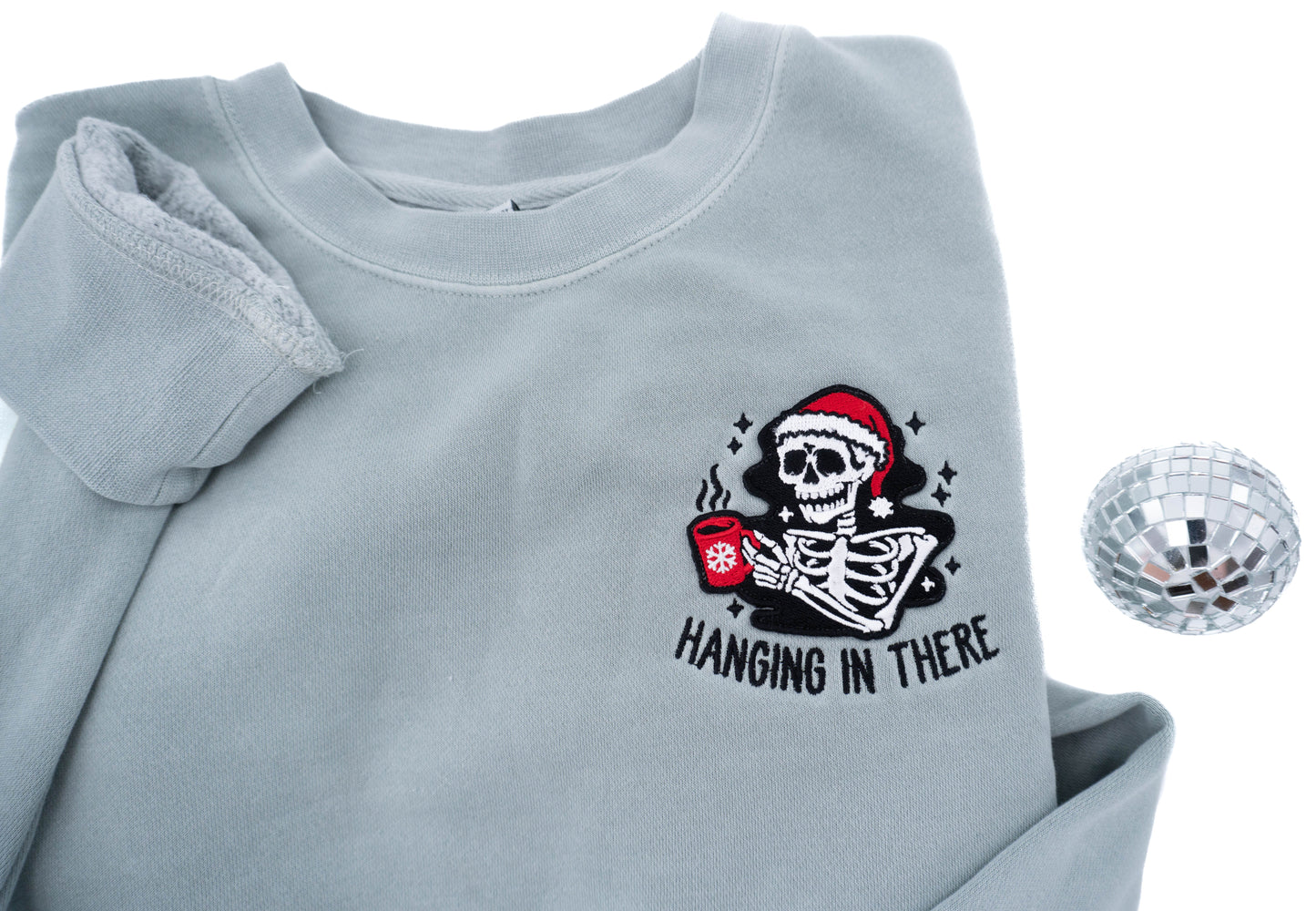Hanging In There Christmas Skeleton - Embroidered Sweatshirt (Sea Salt)