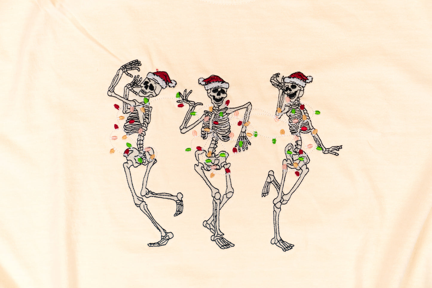 Christmas Dancing Skeleton - Embroidered Tee (Vintage Natural, Short Sleeve)