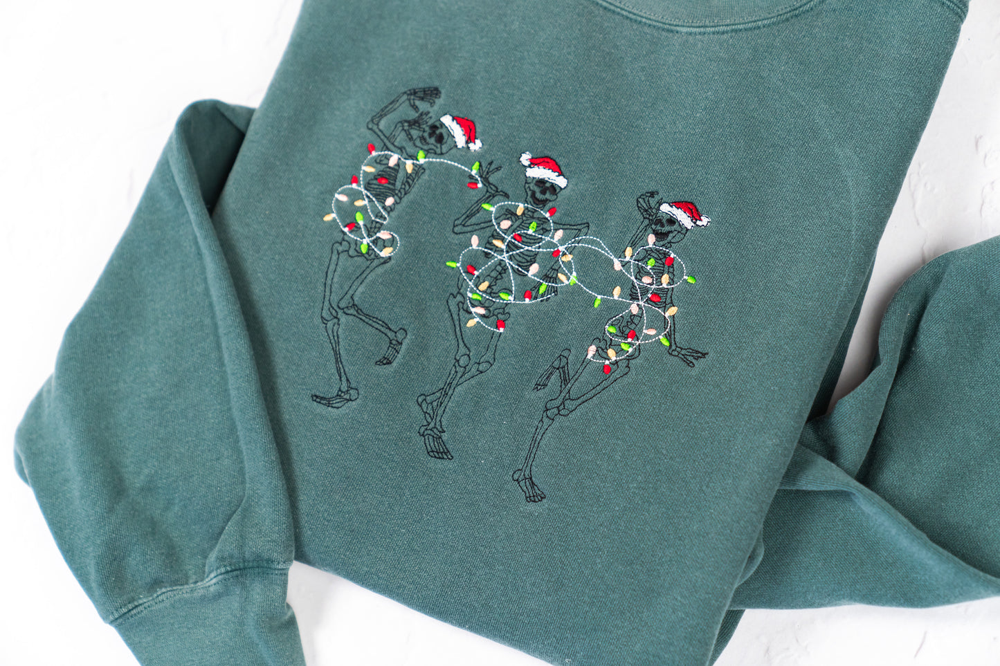 Christmas Dancing Skeleton - Embroidered Sweatshirt (Blue Spruce)