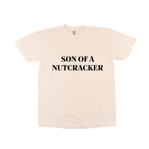Son of a Nutcracker (Black) - Tee (Vintage Natural, Short Sleeve)