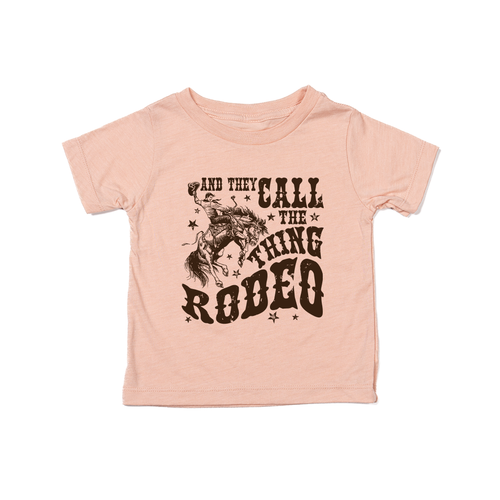 They Call The Thing Rodeo - Kids Tee (Peach)