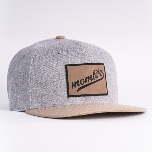 Momlife (Leather Patch) - Flatbill Trucker Hat (Heather Light Gray/Khaki)